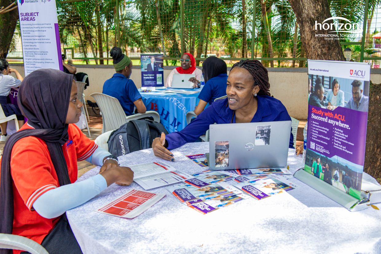 Students and university delegates discussing study opportunities
